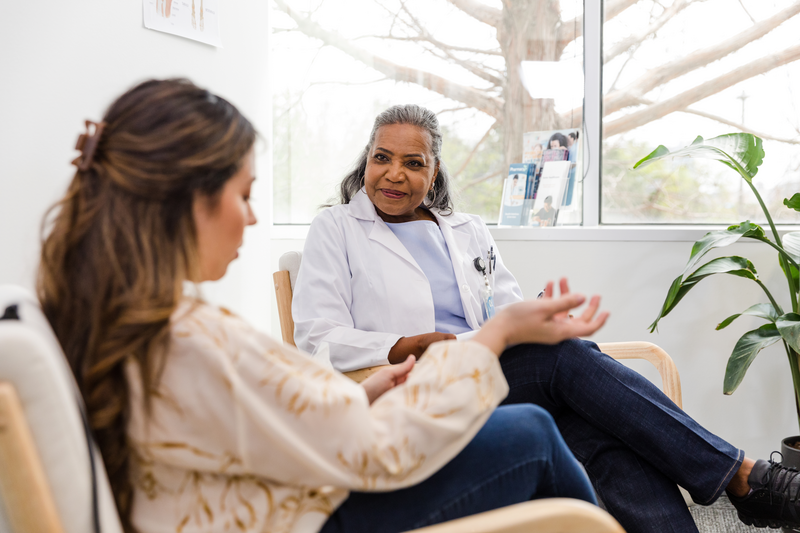 Woman shares issues with post-op recovery with senior female surgeon - stock photo
The mature adult woman gestures as she discusses the issues she has had during her post-operative recovery with the senior adult female surgeon.
