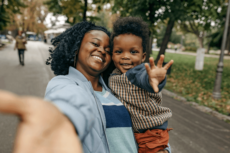 Happy family - stock photo
Mother and son hugging and looking happy, spending time together