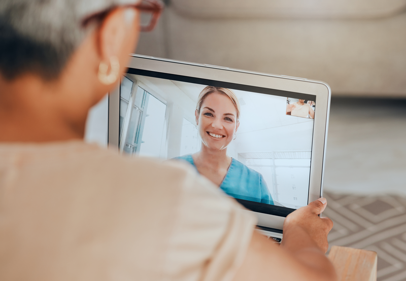 woman having video visit with provider